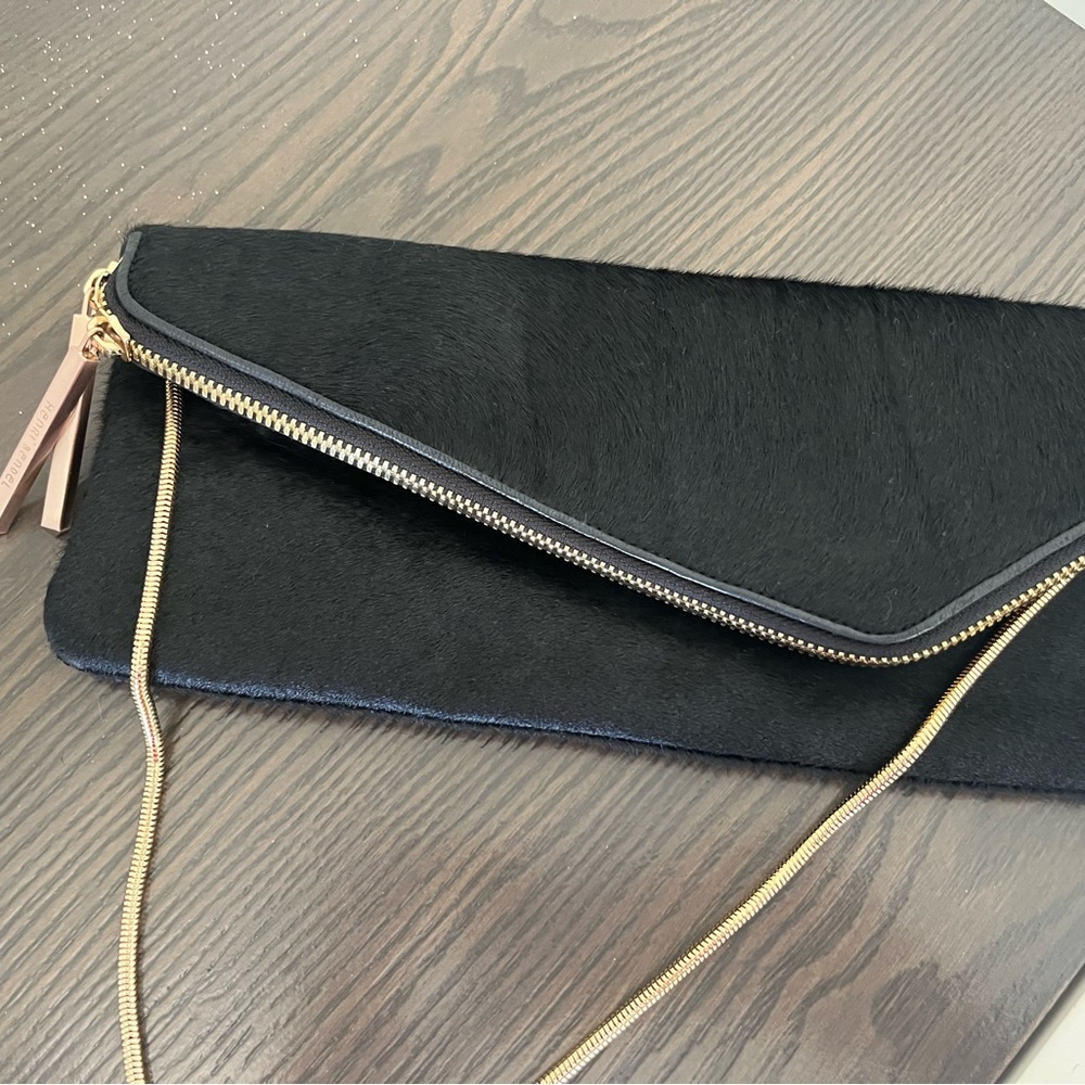 Cowhide rare Henri Bendel clutch/crossbody
